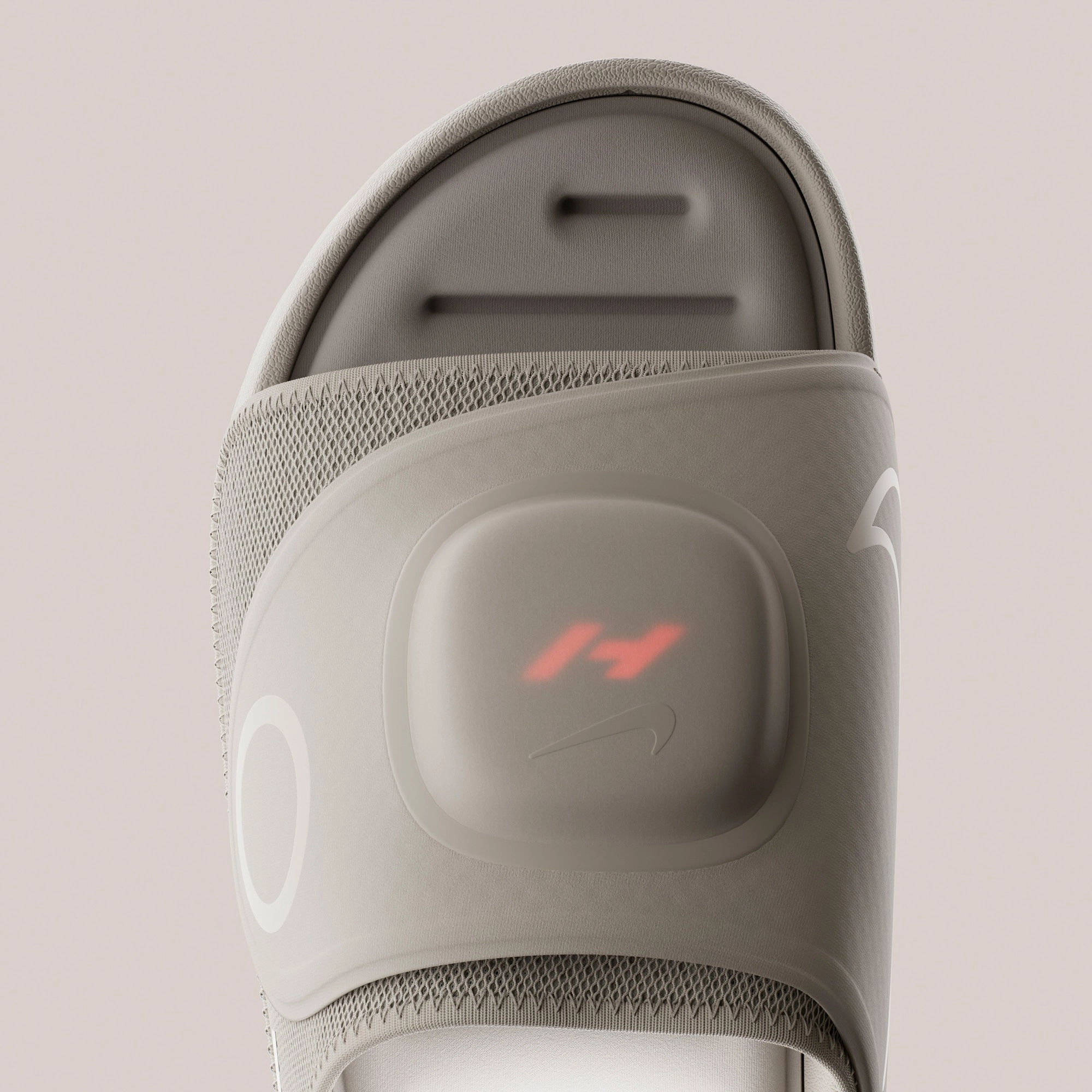 module Hyperslide Pod logé dans la bride, logo Hyperice rouge