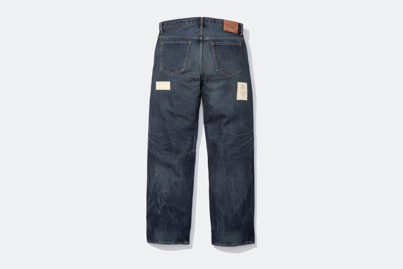 jean collaboration Supreme x Number (N)ine bleu foncé avec étiquettes, vu de dos