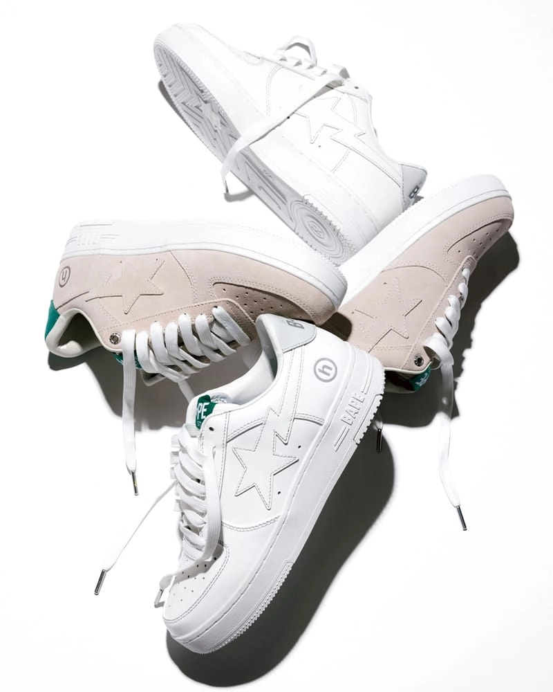 Three BAPE STA Hidden NY in white and beige stacked on a white background