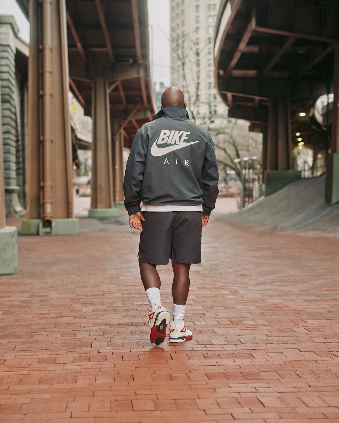 Jeezy from behind wearing the Bike Air Nigel Sylvester jacket