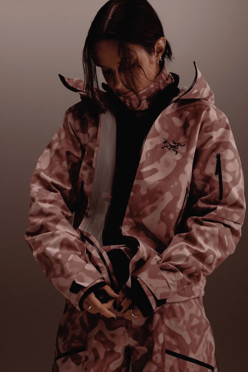 Arc'teryx pink Grottoflage jacket worn by a model