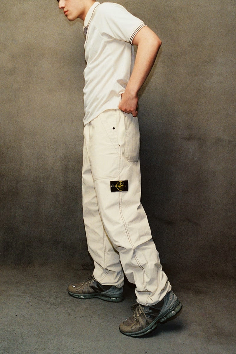 Mannequin wearing the Stone Island x New Balance Abzorb 1890 with ivory cargo pants