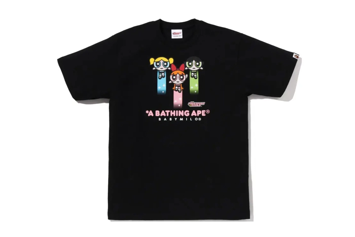 T-shirt noir BAPE avec illustrations des Powerpuff Girls et Baby Milo, posé à plat