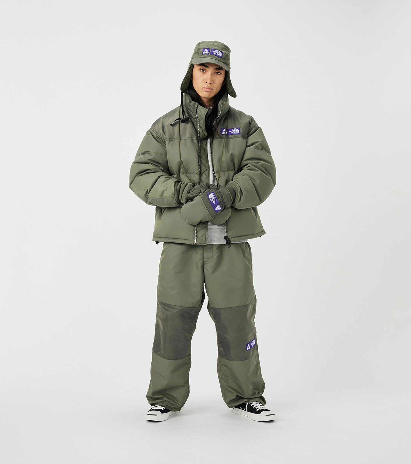 Mannequin wearing khaki The North Face Purple Label x Palace outfit with matching cap