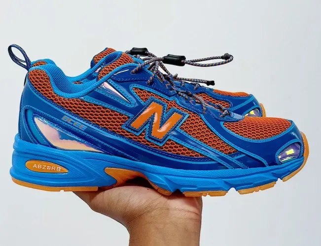 media/rBWjddkYkdLT/tmpamine-new-balance-740v2-benson-tech.webp-2000x2000.webp