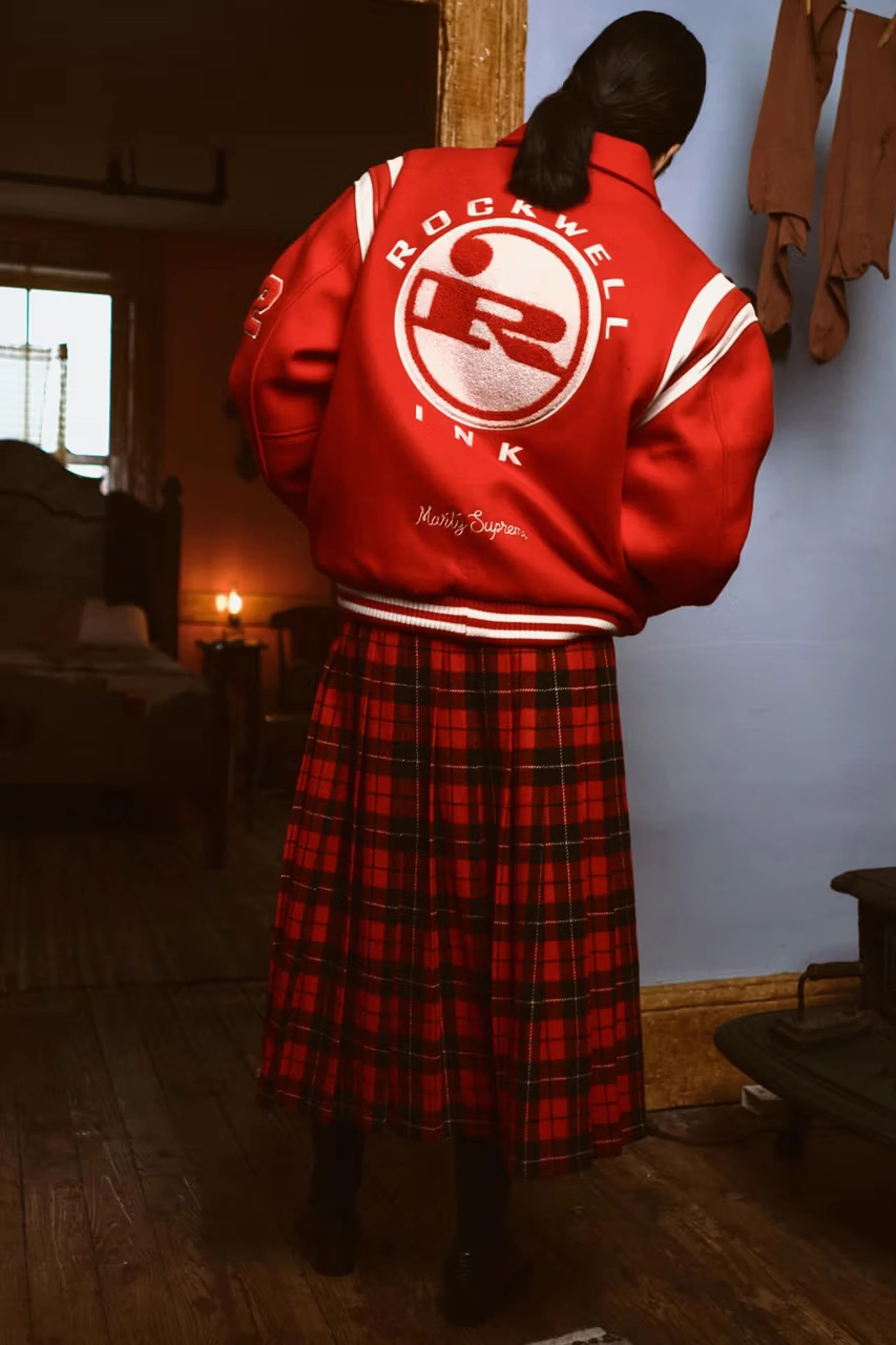 Golf Wang's Marty Supreme Collection woman wearing red jacket from behind