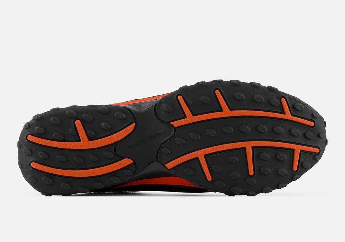 New Balance 204V Neo Flame semelle à crampons noir et orange