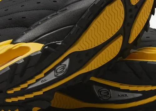 nocta-nike-hot-step-air-terra-black-university-gold-dh4692-002 12.webp