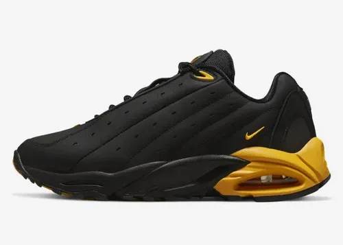 nocta-nike-hot-step-air-terra-black-university-gold-dh4692-002 2.webp