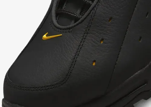 nocta-nike-hot-step-air-terra-black-university-gold-dh4692-002 9.webp